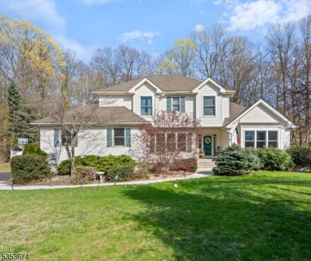traditional home with a front yard