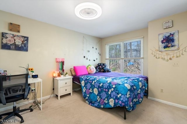 carpeted bedroom with baseboards