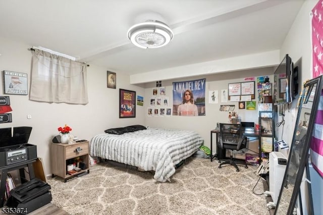 bedroom with wood finished floors