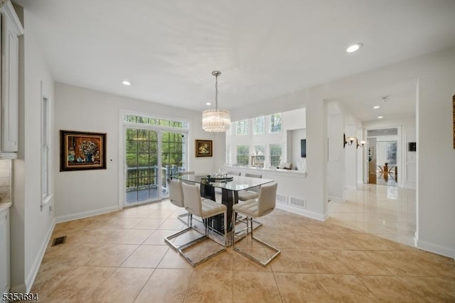 dining area featuring visible vents, recessed lighting, light tile patterned floors, and a notable chandelier
