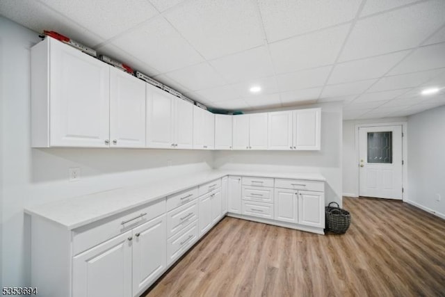 laundry room with recessed lighting and light wood finished floors