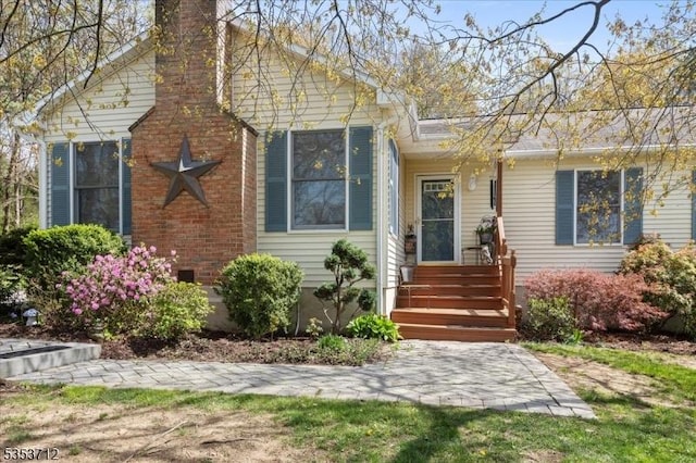 view of front of property featuring a chimney