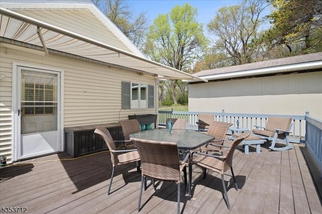deck featuring outdoor dining space