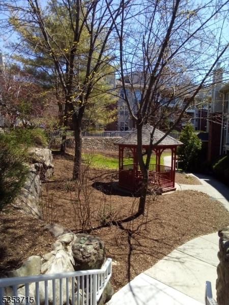 4202 Schindler Ln Unit 4202, Wayne Twp, NJ 07470 - view of yard with a gazebo