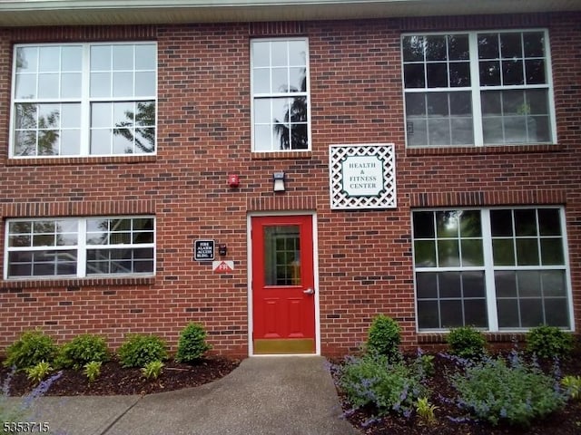 4202 Schindler Ln Unit 4202, Wayne Twp, NJ 07470 - doorway to property featuring brick siding