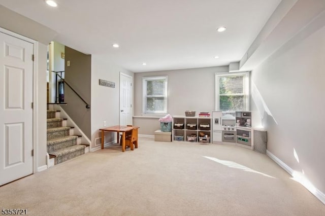 recreation room with recessed lighting, baseboards, and carpet floors