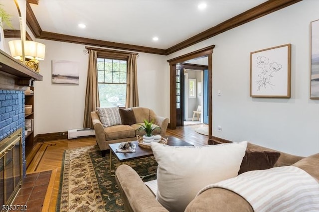 living room with ornamental molding, a baseboard radiator, a fireplace, baseboards, and recessed lighting