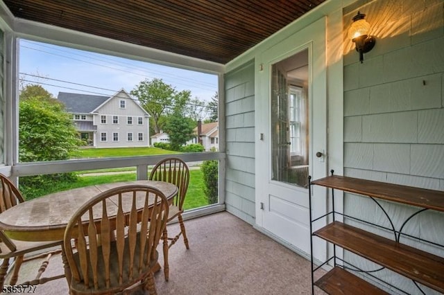 sunroom with plenty of natural light