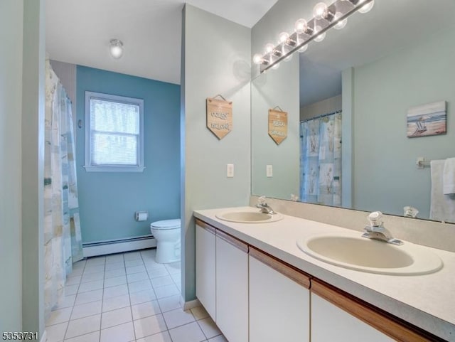 full bathroom with baseboard heating, tile patterned floors, toilet, and a sink