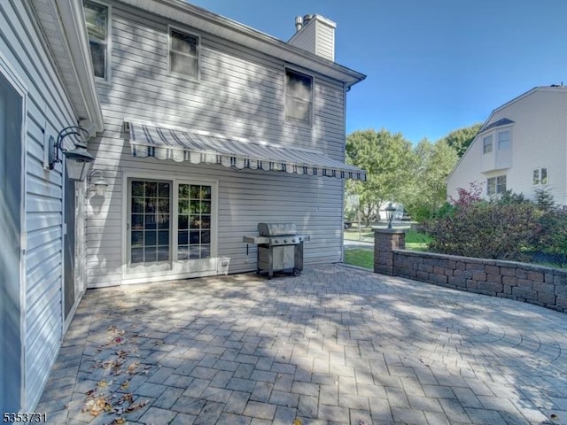 view of patio with a grill