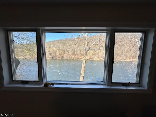 interior details featuring a water view