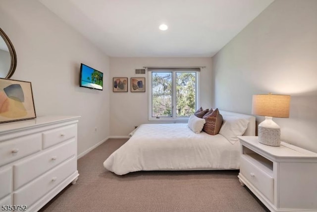 bedroom featuring baseboards, recessed lighting, carpet floors, and visible vents