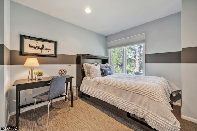 bedroom featuring baseboards and recessed lighting
