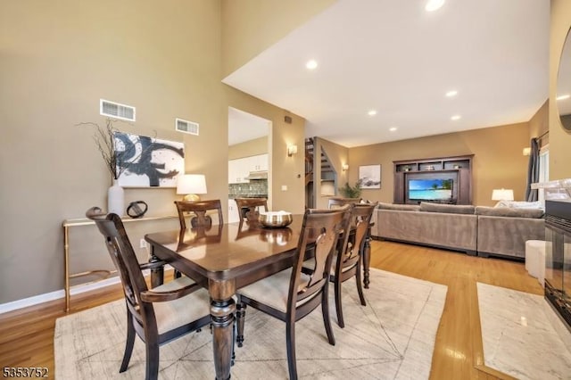 dining room with visible vents, recessed lighting, and light wood-style flooring