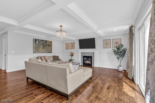 living area with a fireplace with flush hearth, crown molding, beamed ceiling, dark wood-style floors, and coffered ceiling