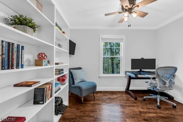 office space featuring baseboards, ornamental molding, ceiling fan, and wood finished floors