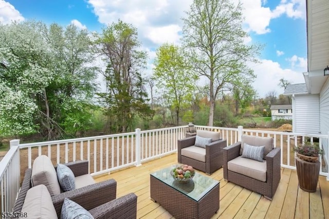 wooden terrace with outdoor lounge area