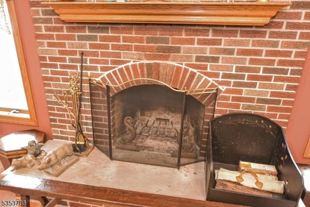 interior details with a fireplace
