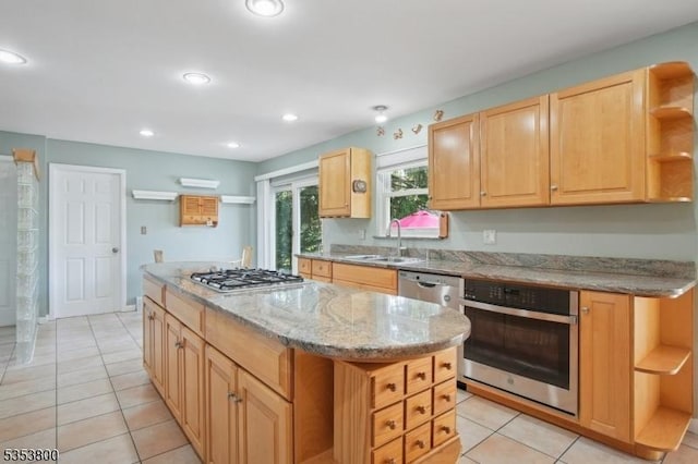 kitchen with stainless steel appliances, open shelves, a sink, a kitchen island, and recessed lighting