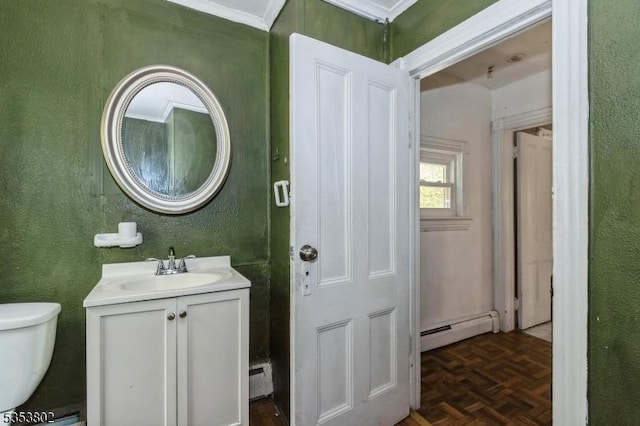 590 Valley Rd, Long Hill Twp, NJ 07933 - bathroom featuring toilet, baseboard heating, a baseboard heating unit, a textured wall, and vanity