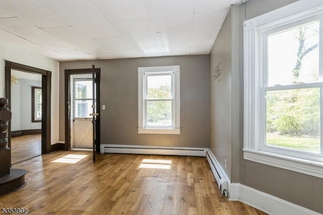 590 Valley Rd, Long Hill Twp, NJ 07933 - entryway featuring baseboards, a baseboard radiator, and hardwood / wood-style floors