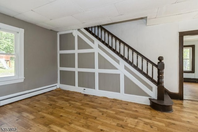 590 Valley Rd, Long Hill Twp, NJ 07933 - interior space with plenty of natural light, wood finished floors, baseboard heating, and stairs