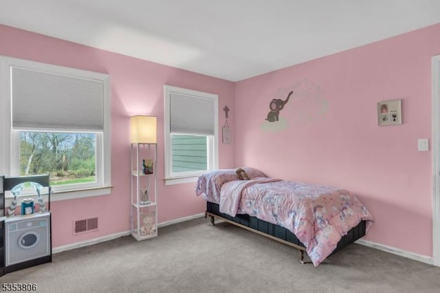 bedroom with visible vents, baseboards, and carpet floors