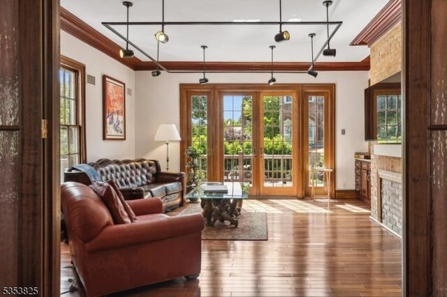 2 Perry St, Morristown Town, NJ 07960 - living area featuring hardwood / wood-style floors, baseboards, and crown molding
