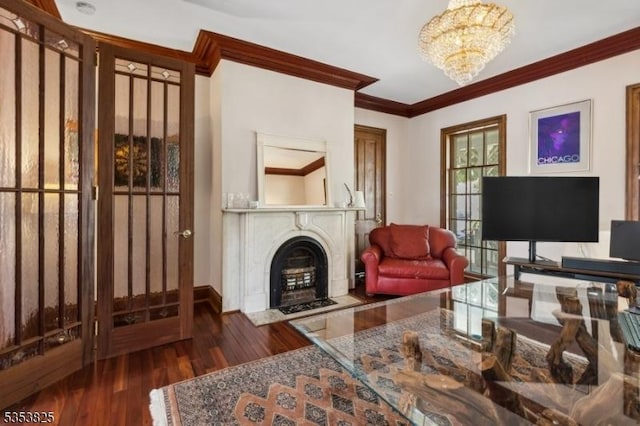 2 Perry St, Morristown Town, NJ 07960 - living area with an inviting chandelier, a fireplace, a healthy amount of sunlight, ornamental molding, and wood finished floors