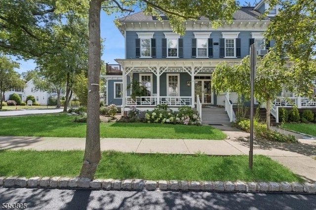 2 Perry St, Morristown Town, NJ 07960 - view of front facade with covered porch and a front lawn
