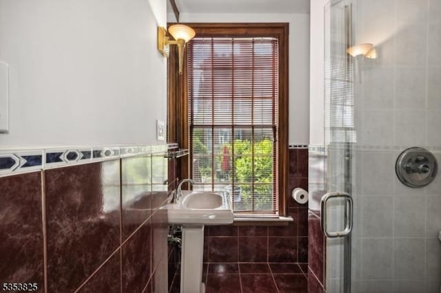 2 Perry St, Morristown Town, NJ 07960 - bathroom featuring a wainscoted wall, tile walls, a sink, and a shower stall