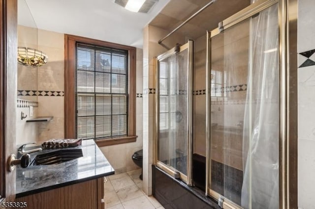 2 Perry St, Morristown Town, NJ 07960 - full bathroom with tile walls, a stall shower, toilet, and vanity