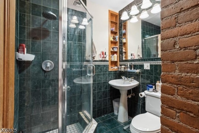 2 Perry St, Morristown Town, NJ 07960 - full bathroom with tile walls, a stall shower, tile patterned floors, and toilet