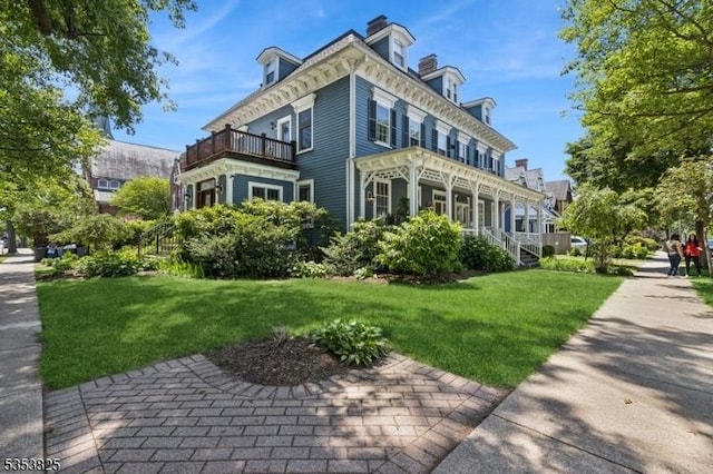 2 Perry St, Morristown Town, NJ 07960 - view of side of home featuring a balcony and a yard