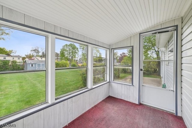 unfurnished sunroom featuring a wealth of natural light