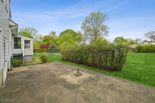 view of patio / terrace with fence