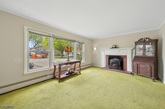 carpeted living area with crown molding, a wood stove, baseboards, and a baseboard heating unit