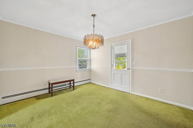 carpeted spare room with crown molding, baseboards, baseboard heating, and a chandelier