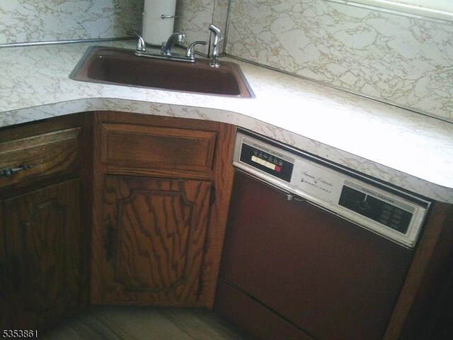 5 Franklin Ave, Montclair Twp, NJ 07042 - room details with light countertops, a sink, and dishwashing machine