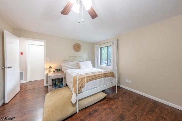 2324 Old Stone Mill Dr, East Windsor Twp, NJ 08512 - bedroom featuring wood finished floors, baseboards, and ceiling fan