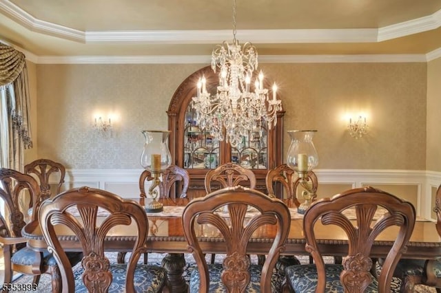 28 Arbor Rd, North Caldwell Boro, NJ 07006 - dining room with a chandelier, wainscoting, a tray ceiling, ornamental molding, and a decorative wall
