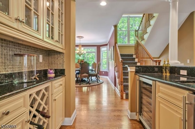 28 Arbor Rd, North Caldwell Boro, NJ 07006 - kitchen with cream cabinetry, beverage cooler, light wood-style flooring, and recessed lighting