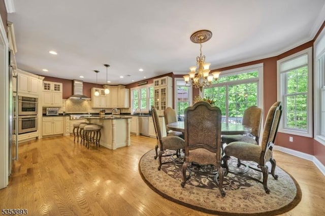28 Arbor Rd, North Caldwell Boro, NJ 07006 - dining room with a chandelier, recessed lighting, light wood-style floors, ornamental molding, and baseboards