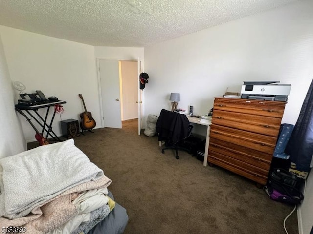 office area with carpet flooring and a textured ceiling