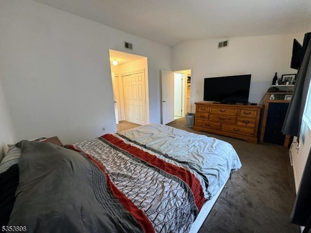bedroom with carpet floors, vaulted ceiling, and visible vents