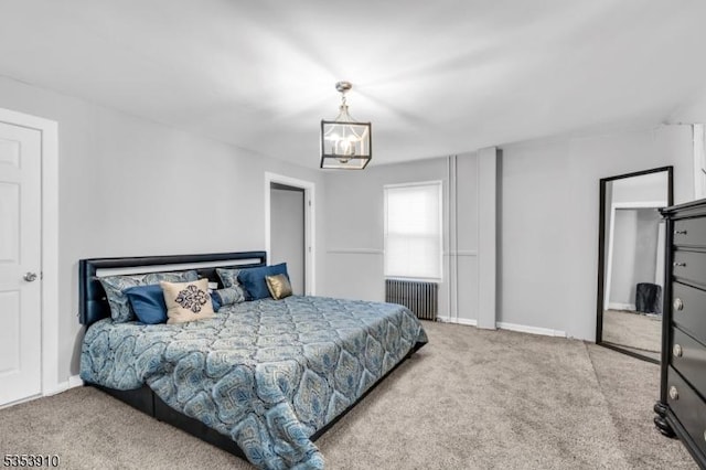 carpeted bedroom with baseboards, a notable chandelier, and radiator