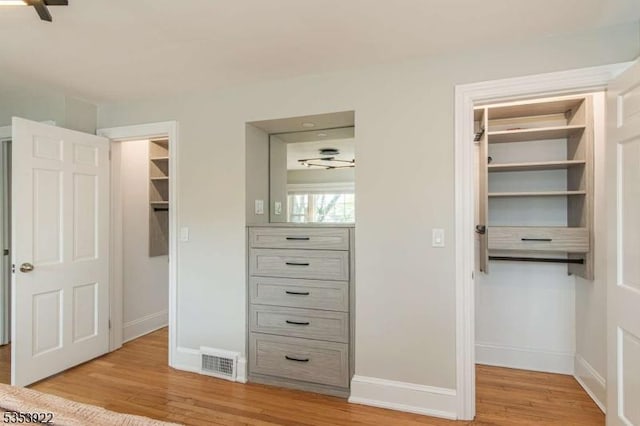 closet featuring visible vents