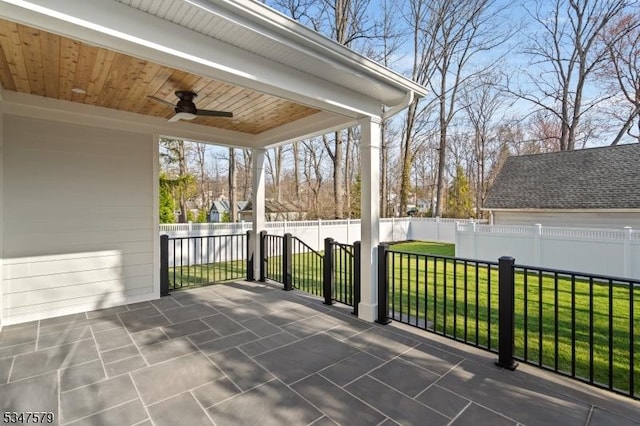 view of patio / terrace featuring a ceiling fan and fence private yard