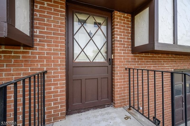 318 Sunnyside Ter, Bridgewater Twp, NJ 08807 - doorway to property featuring brick siding