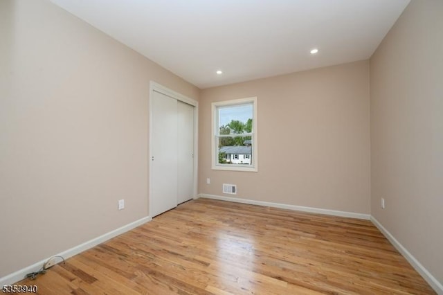 318 Sunnyside Ter, Bridgewater Twp, NJ 08807 - unfurnished room with recessed lighting, baseboards, visible vents, and light wood finished floors